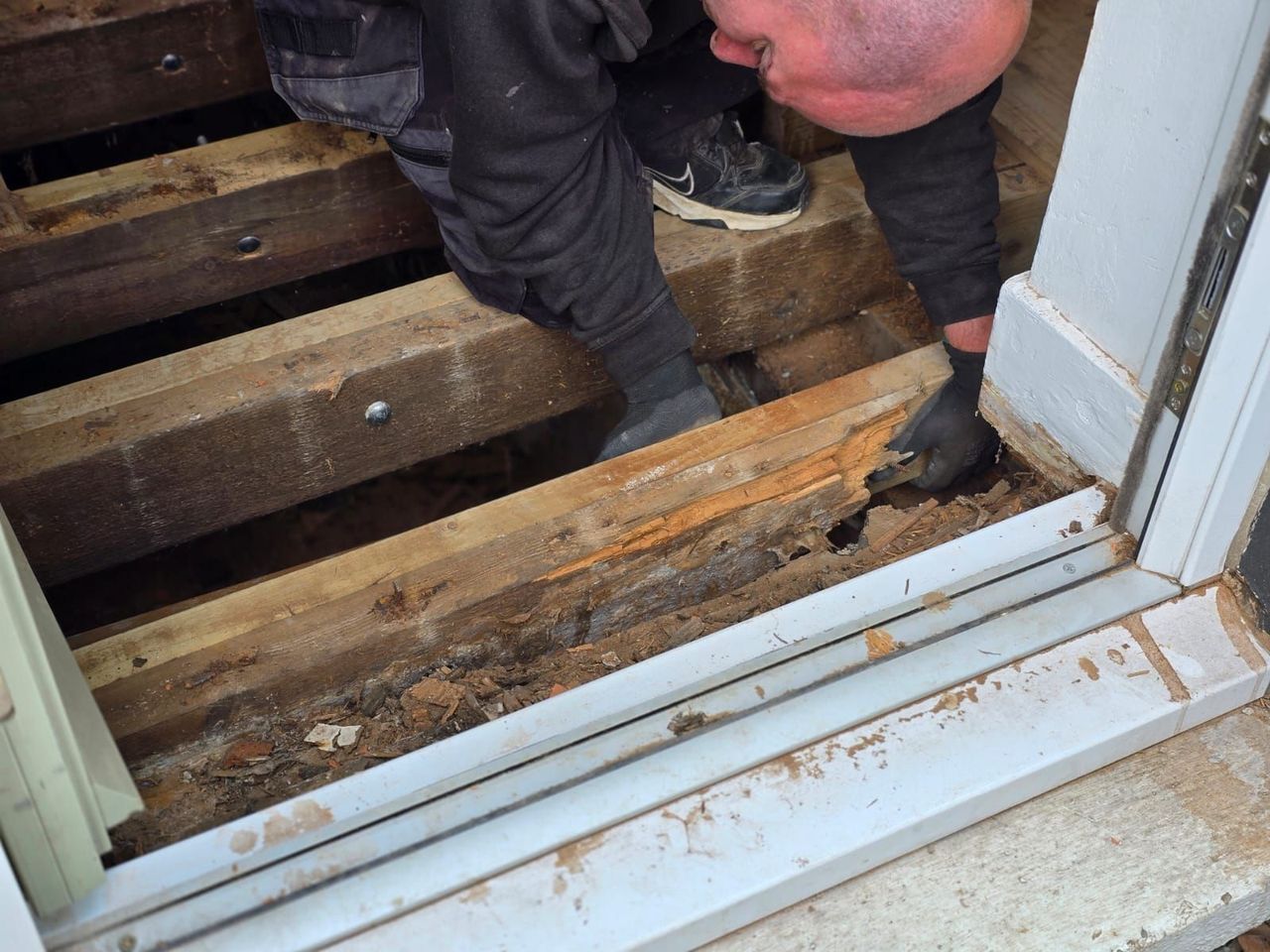 Removing rotting timber